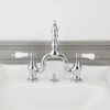 High Spout 8 Inch Bridge Lavatory Faucet - Porcelain Lever Handles
