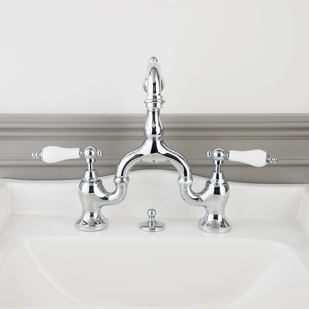 High Spout 8 Inch Bridge Lavatory Faucet - Porcelain Lever Handles